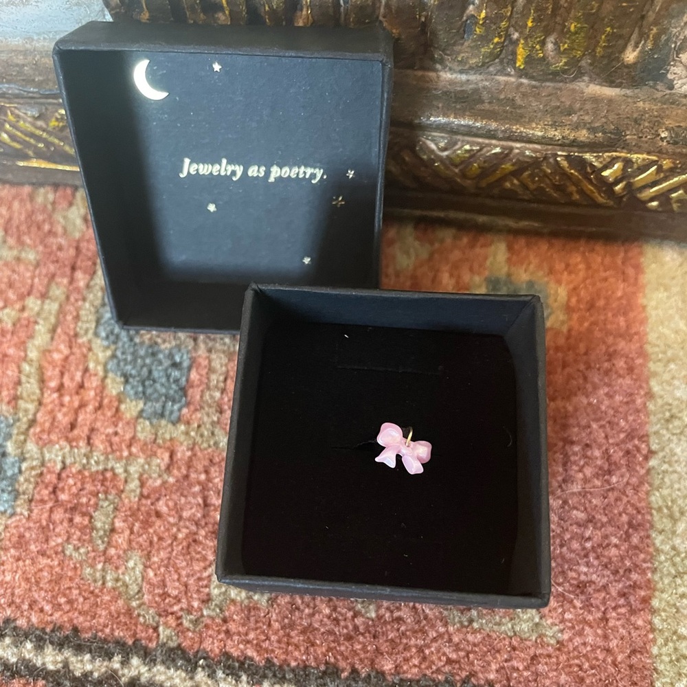 Pink bow tie charm